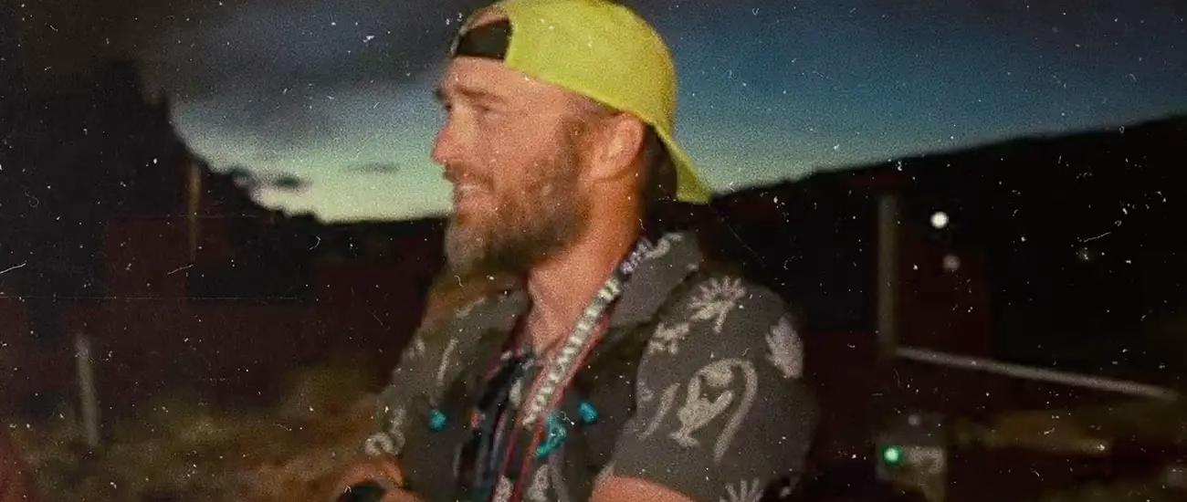 Man at the finish line of an ultratrail race in the desert of Utah.