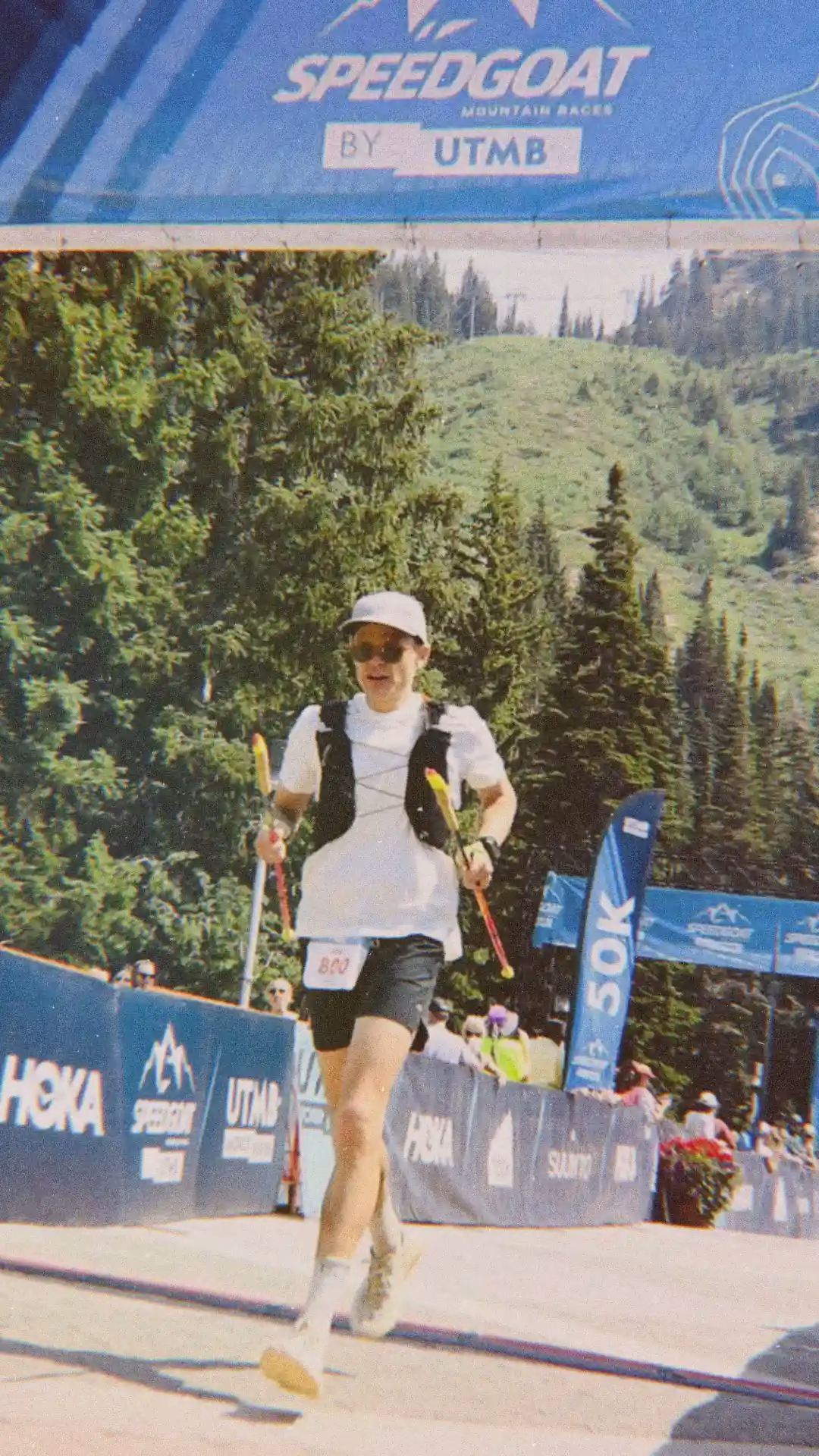 Man crossing the finish line of an ultramarathon