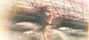 Person in a blurred urban setting. Scott Jurek.