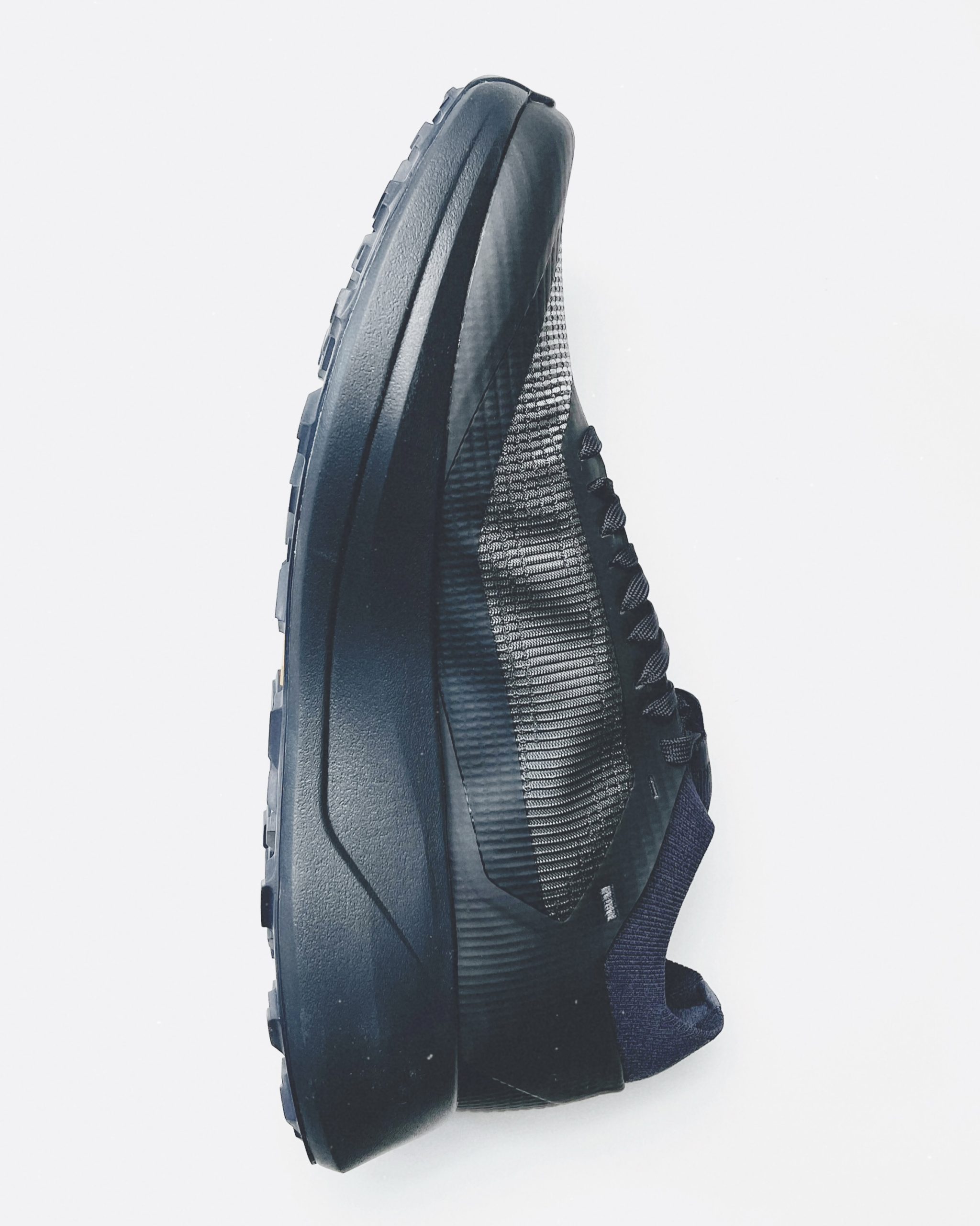 Black athletic shoe on white background Arc'Teryx Sylan 2