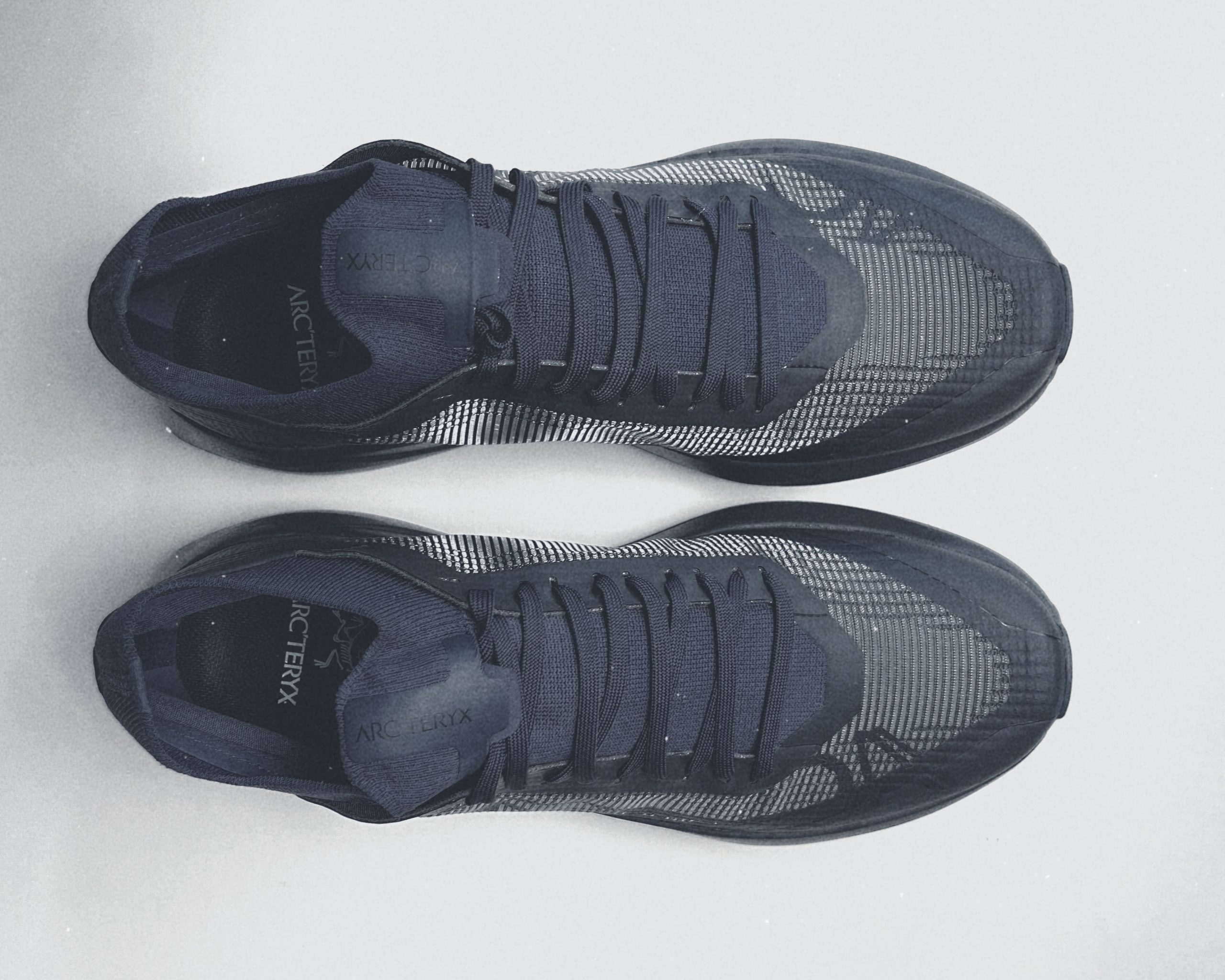 Black athletic shoes with mesh design - Arc'Teryx Sylan 2