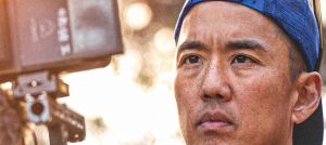 Man focused on filming outdoors. Billy Yang