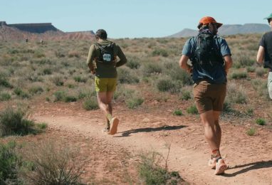 Runners on a desert trail. Luxury Running Brands.