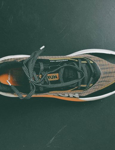 Black and orange athletic sneaker top view Kipsummit Max
