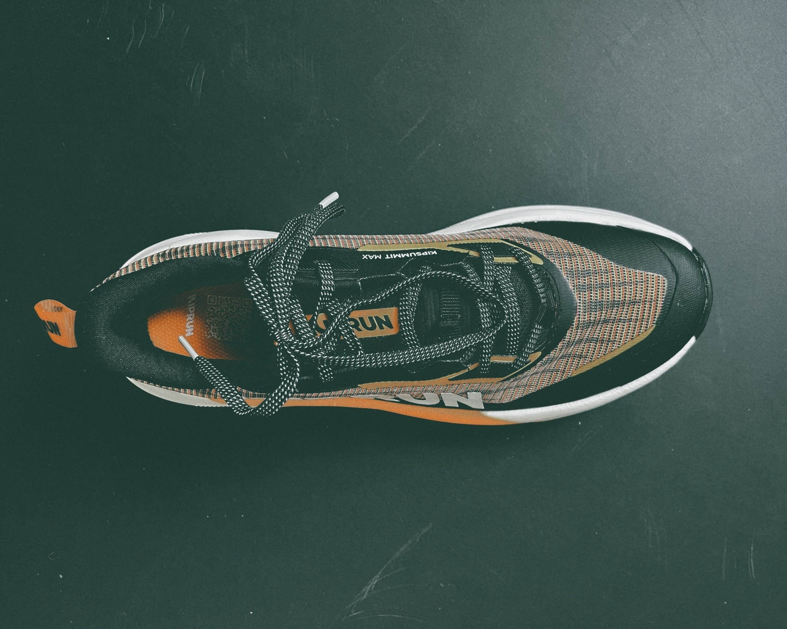 Black and orange athletic sneaker top view Kipsummit Max