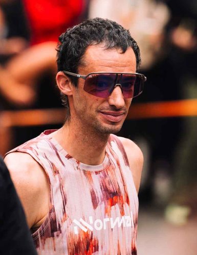 Runner at finish line of major trail race - Kilian Jornet