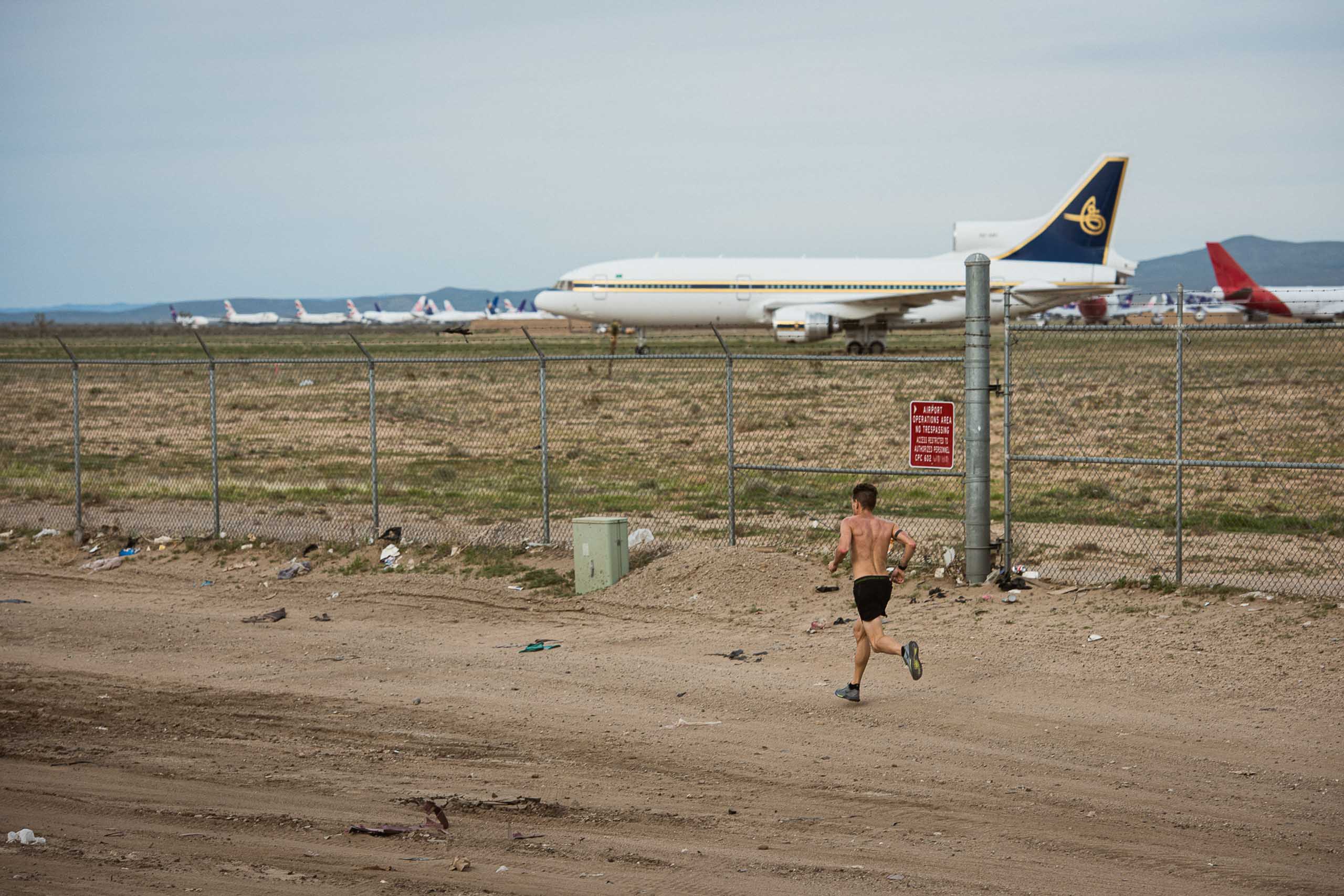 The Speed Project - Christian Brecheis - Borderlands Trail Running-12 Nils Arend through the desert and past airports heading toward the Las Vegas Strip.