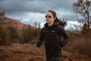 Runner crossing a cattle guard.