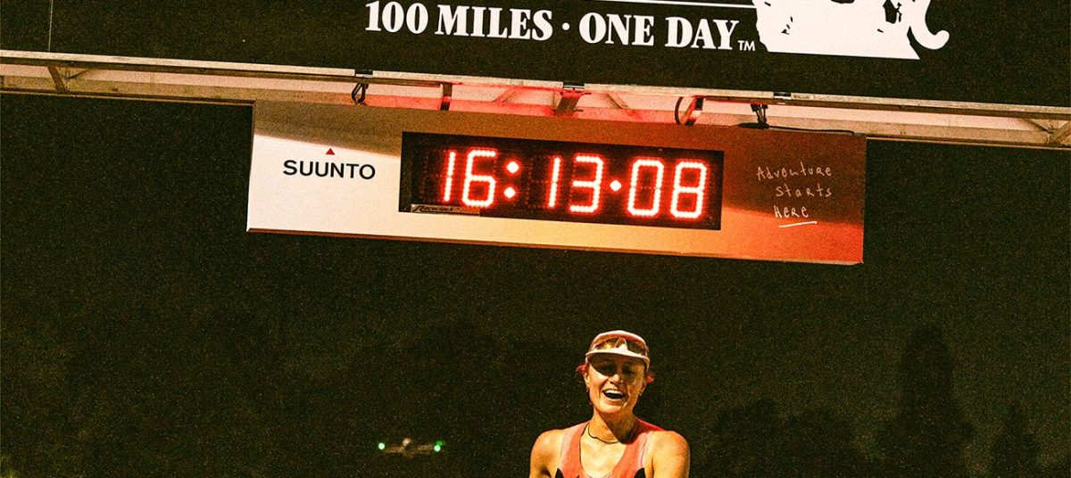 Runner Tara Dower celebrating at finish line