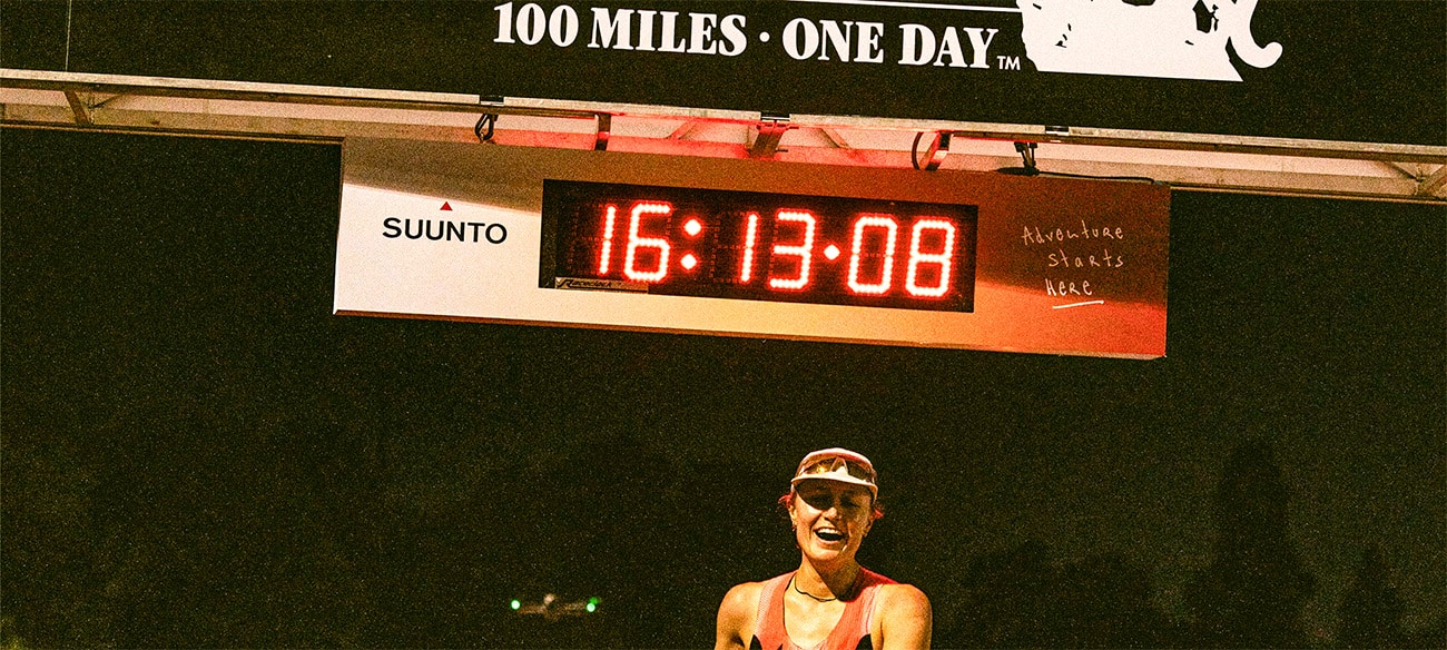 Runner Tara Dower celebrating at finish line
